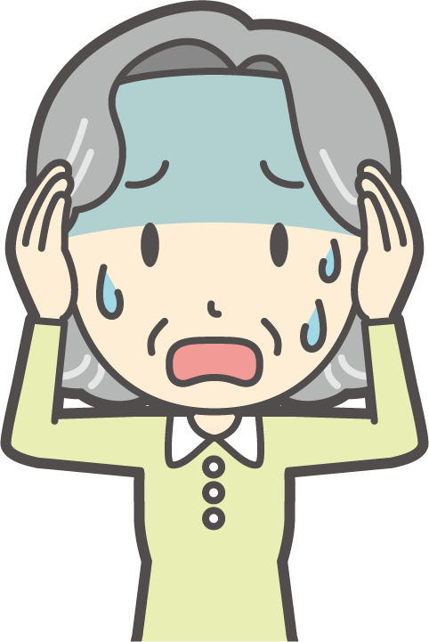 頭を抱え青ざめる女性